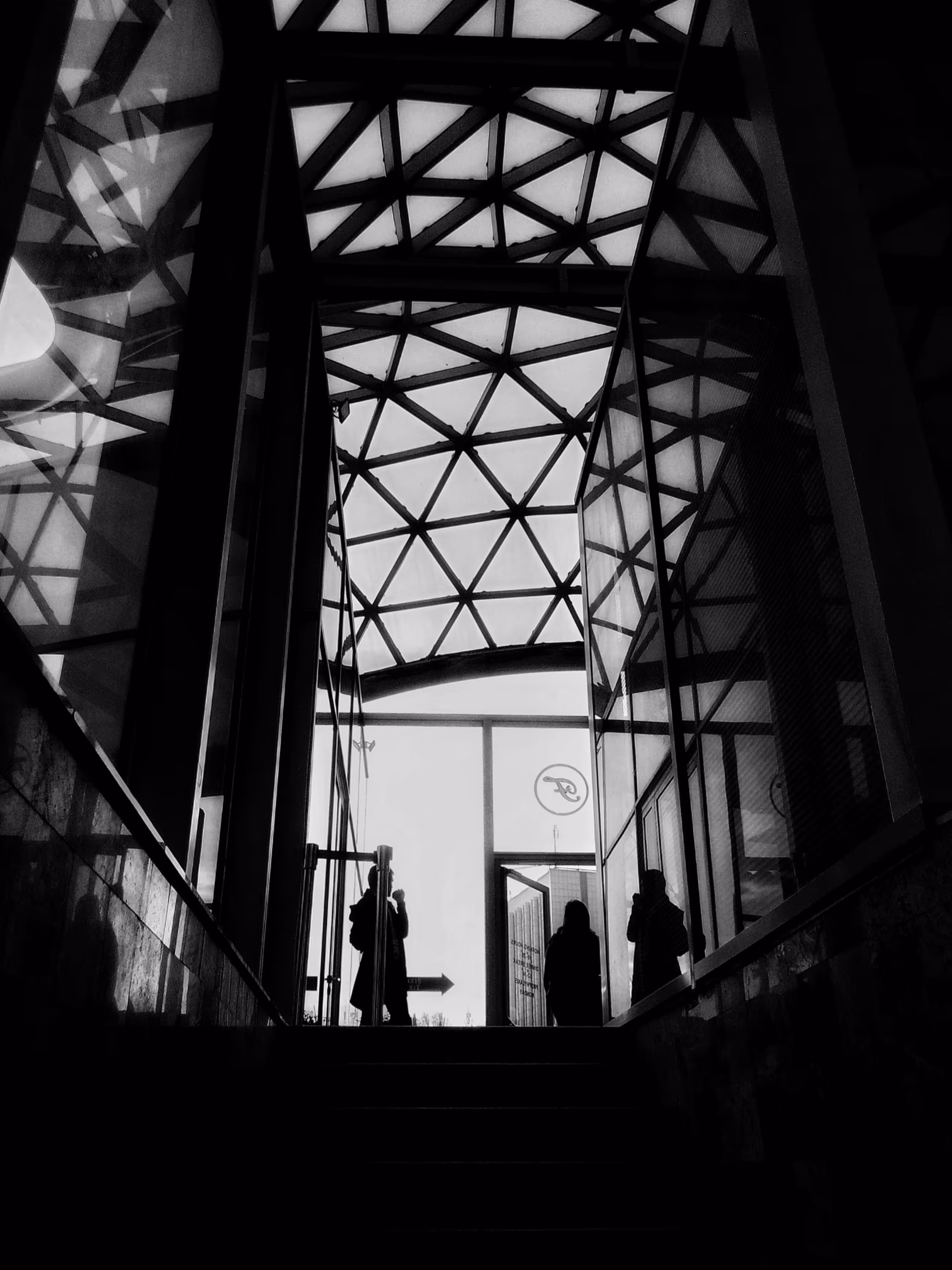 Home_Our_Approach_2 A silhouetted geodesic roofed stairwell